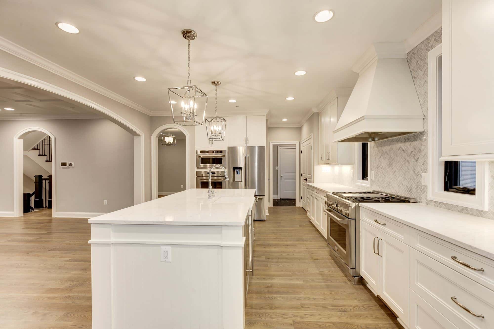 Kitchen, opposite angle — the workspace behind the party