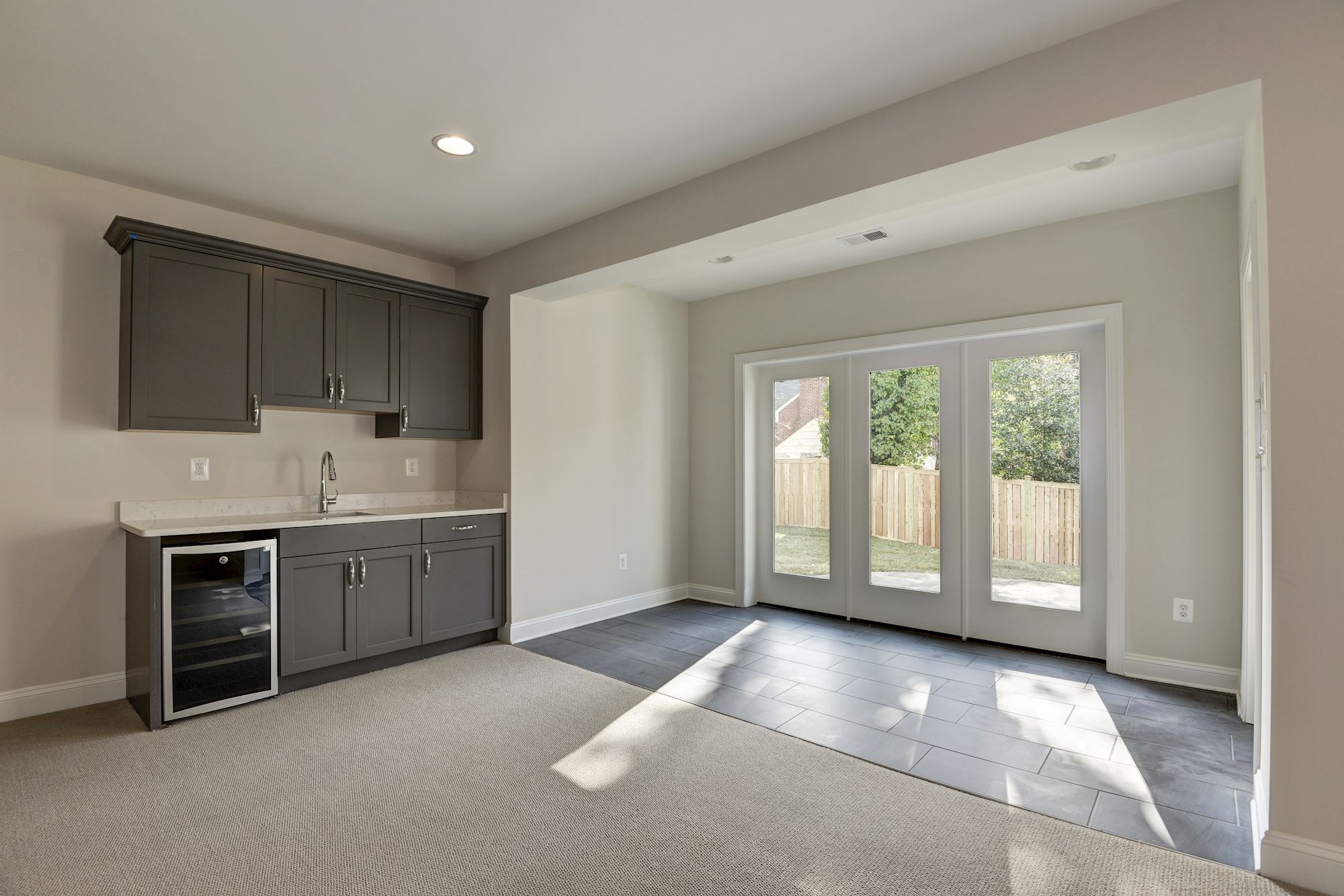 Lower level — movie nights, playdates, grandparents visiting
