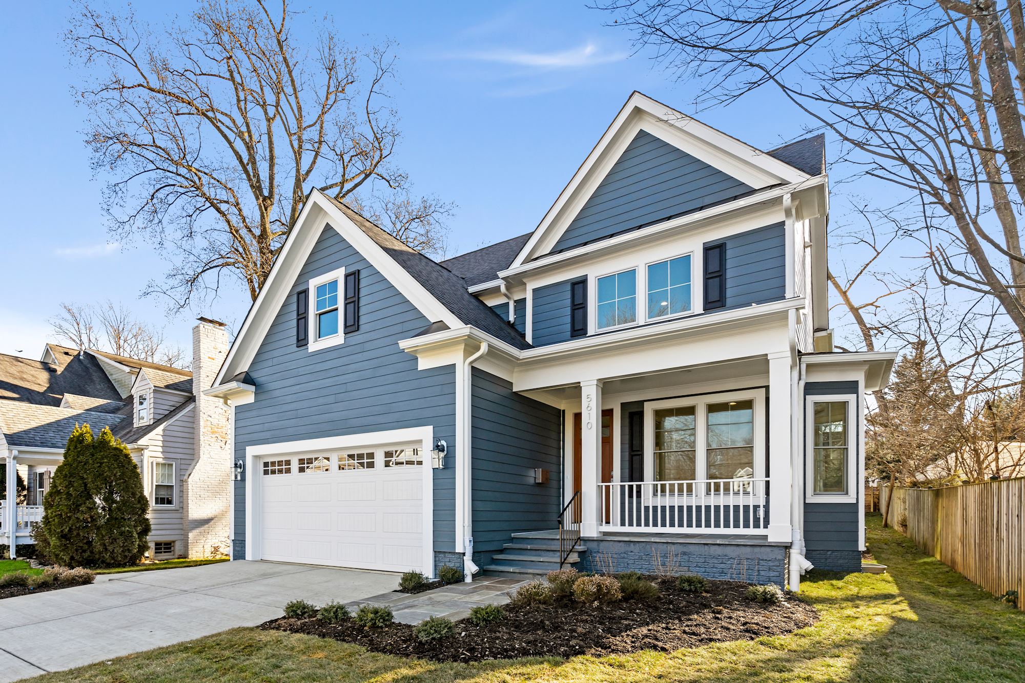 Craftsman proportion with a porch worth keeping.