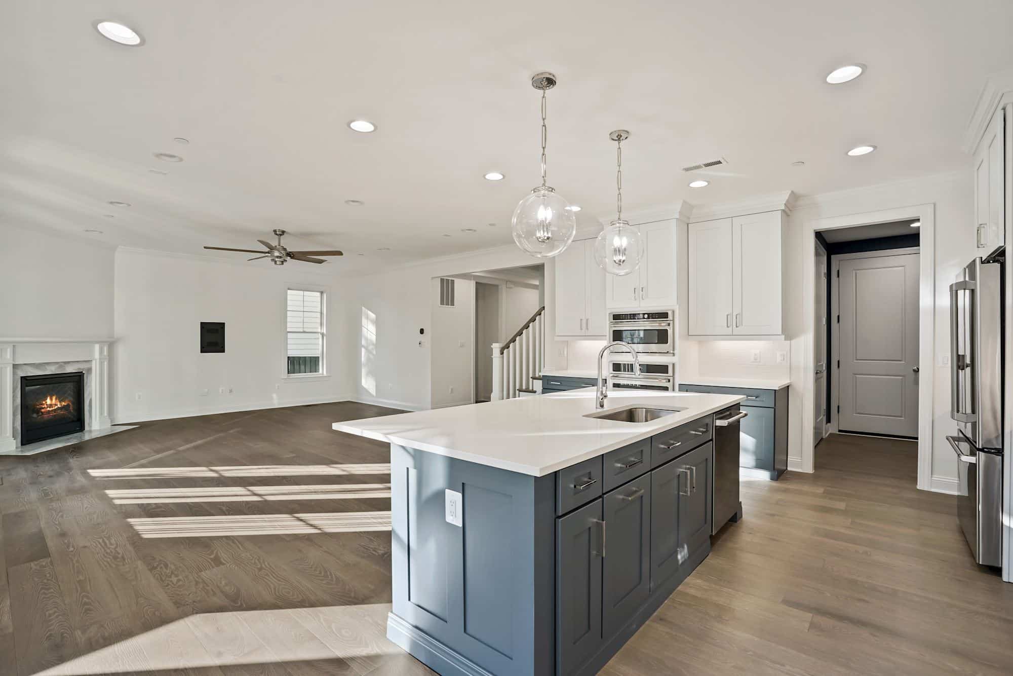 Island, range, fireplace - all in one sightline.