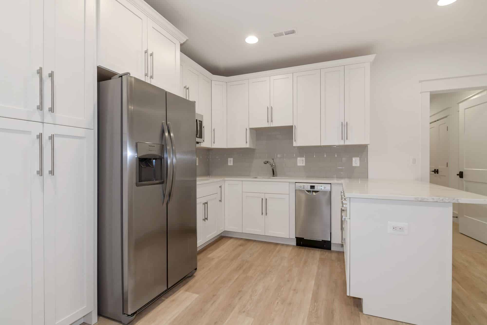 Steel appliances, clean sightlines, a layout that thinks ahead.