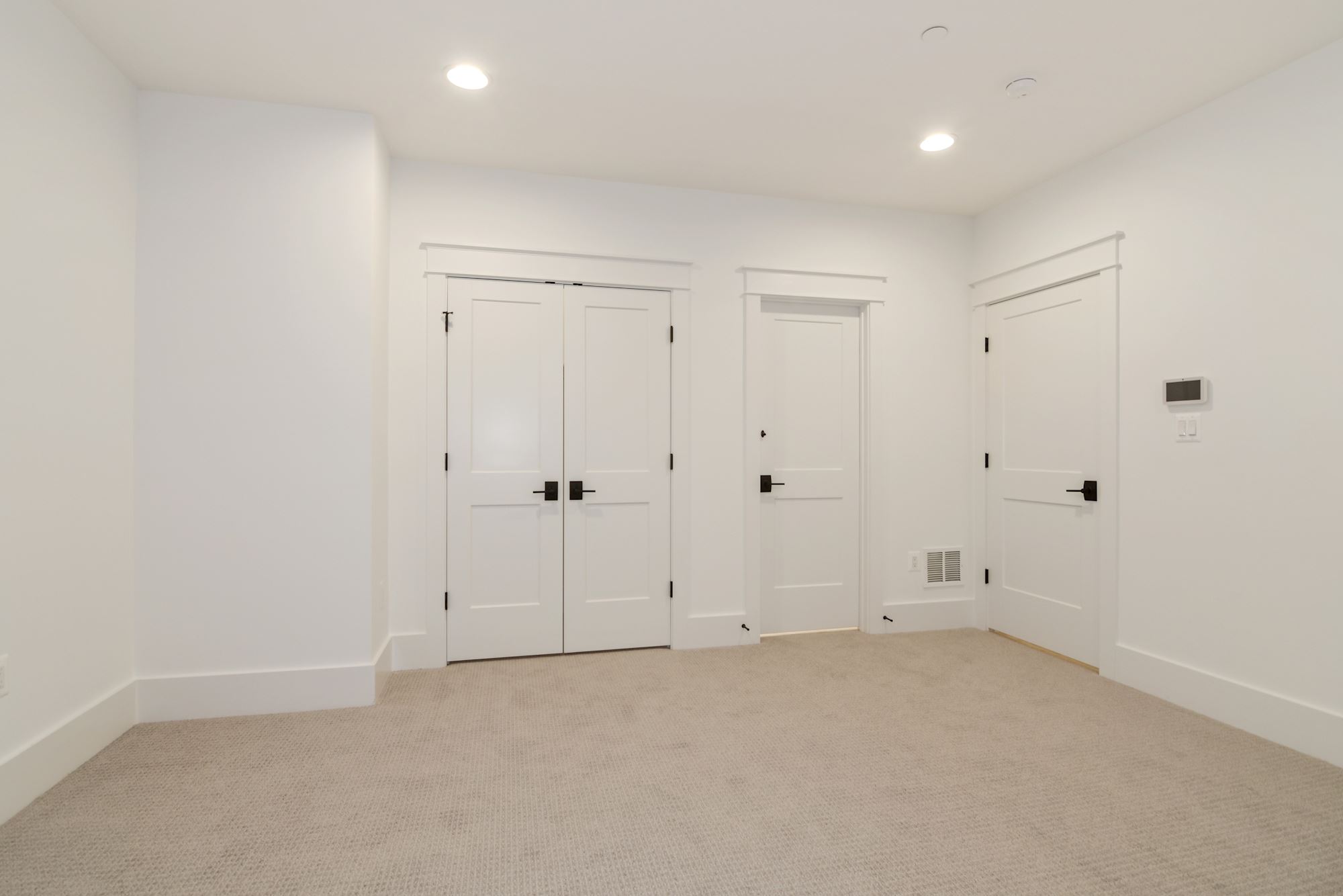 Double closets, private entry, a room that holds its ground.