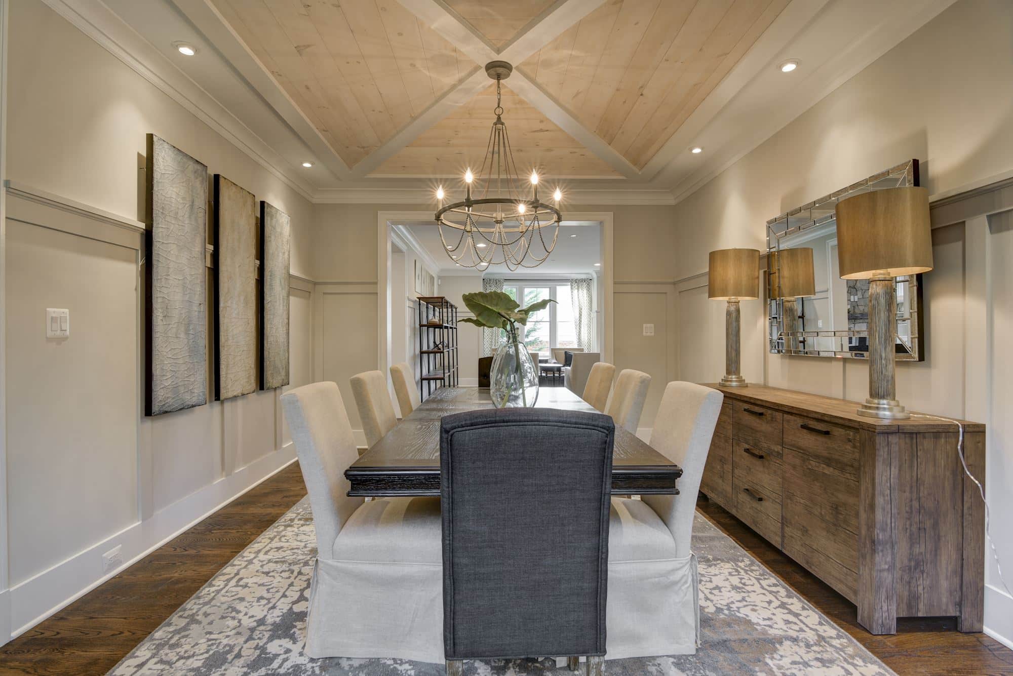 Long table, vaulted wood above, conversation has nowhere to rush.