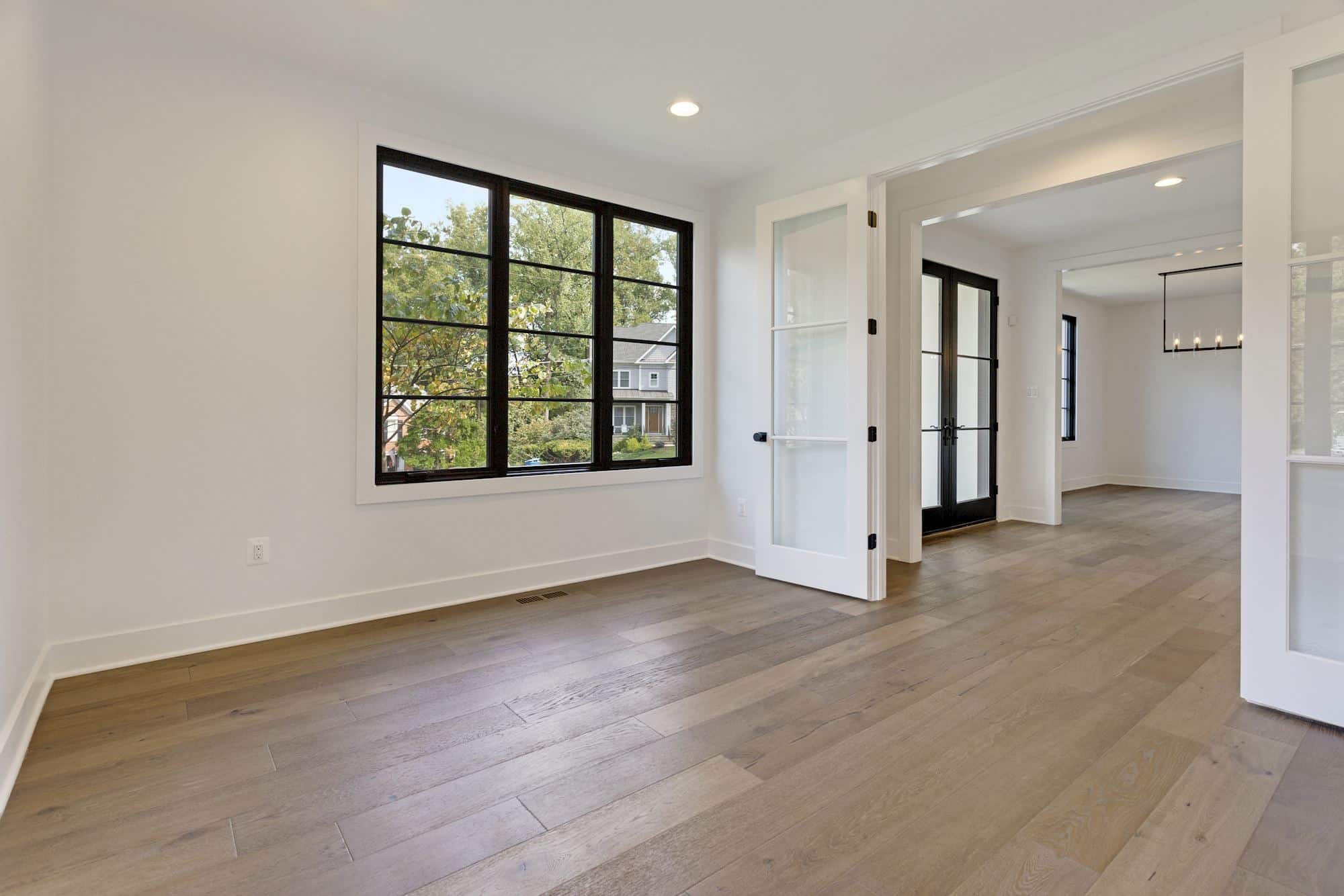 French doors and steel windows define this refined home office.