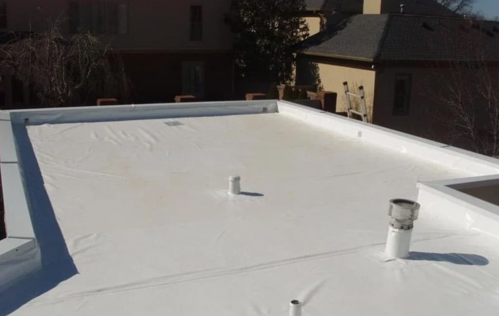 single-ply roofing system, which is made from a single layer of synthetic rubber, PVC, or TPO