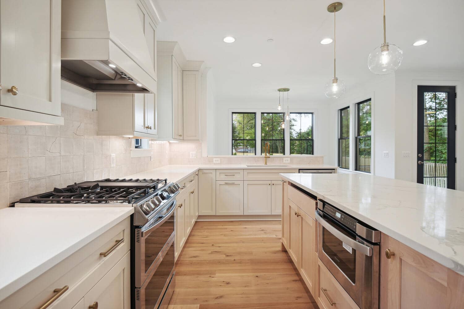 Two ovens, one range, zero compromises on prep space.