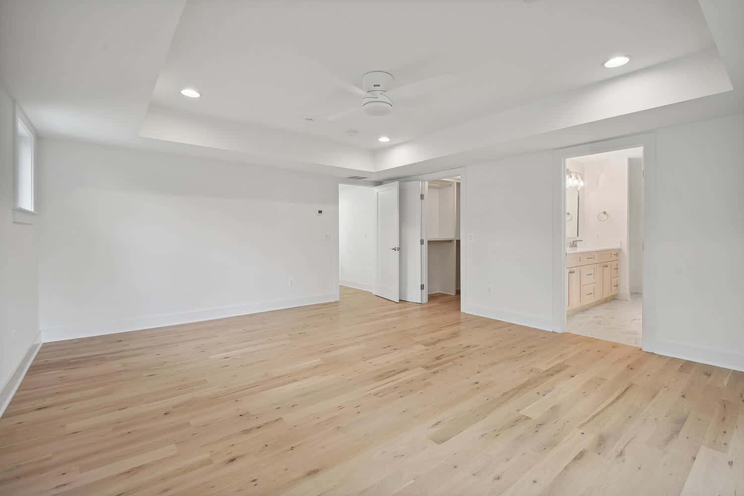 Tray ceiling draws the eye up, suite opens wide.