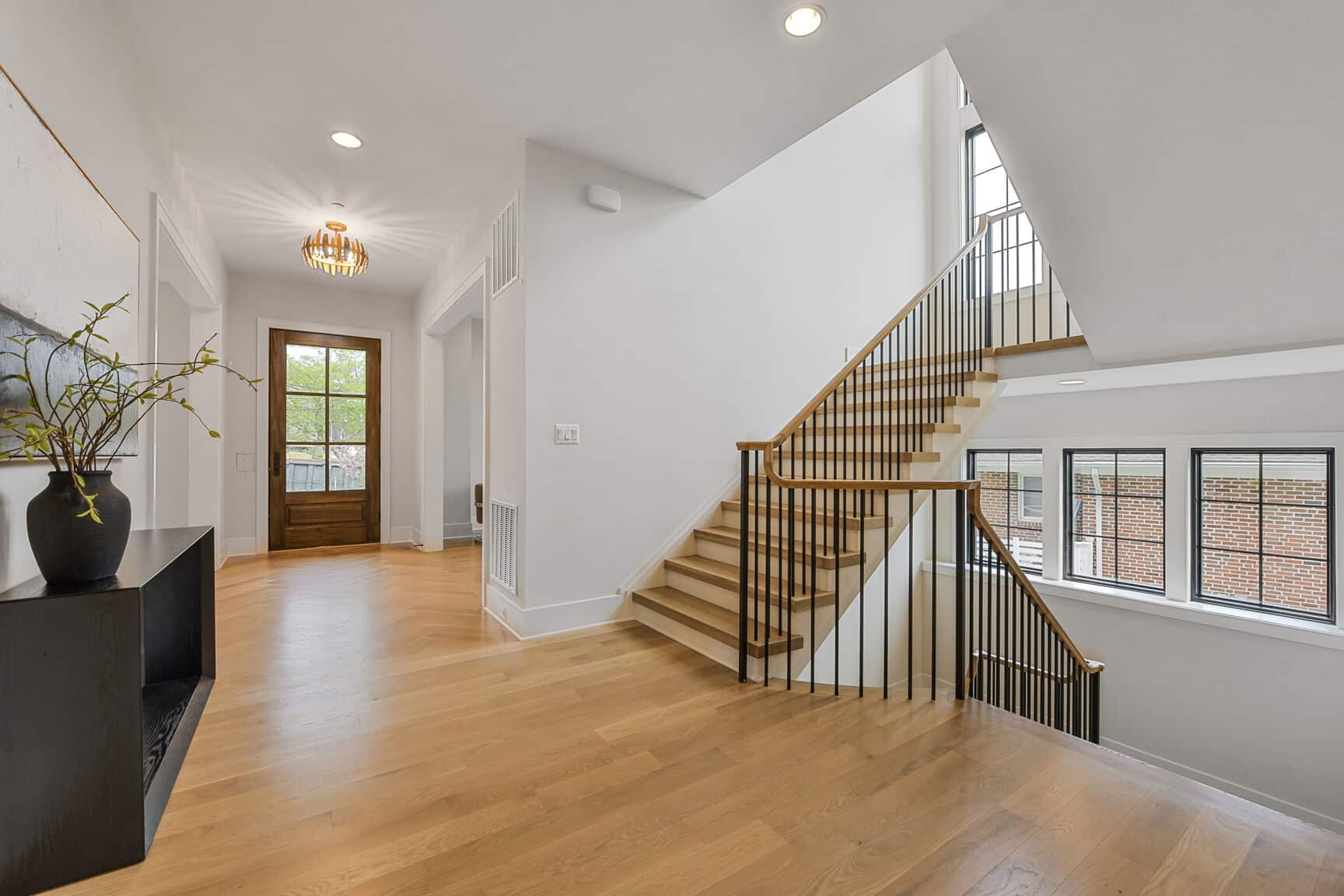 The first thing you see — white oak, natural light, and room to breathe.