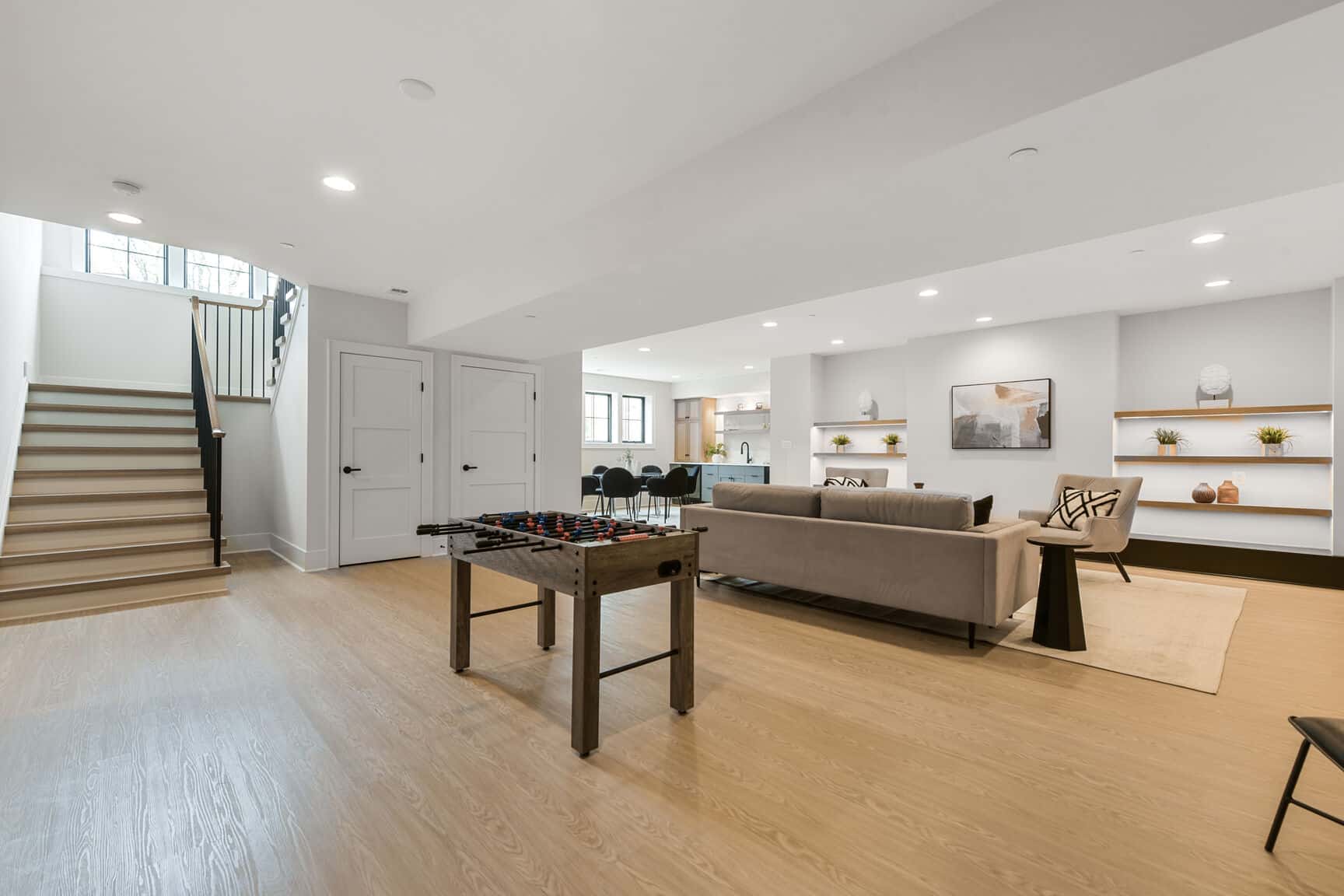 Game table, seating, a bar - the floor below does more.