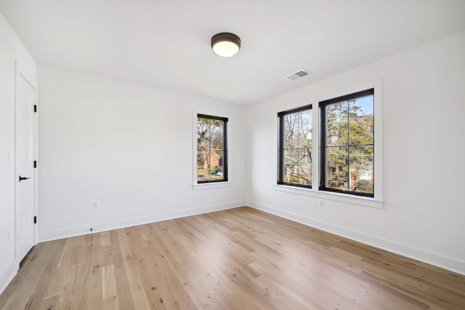Three windows, corner light, and nothing competing for it.
