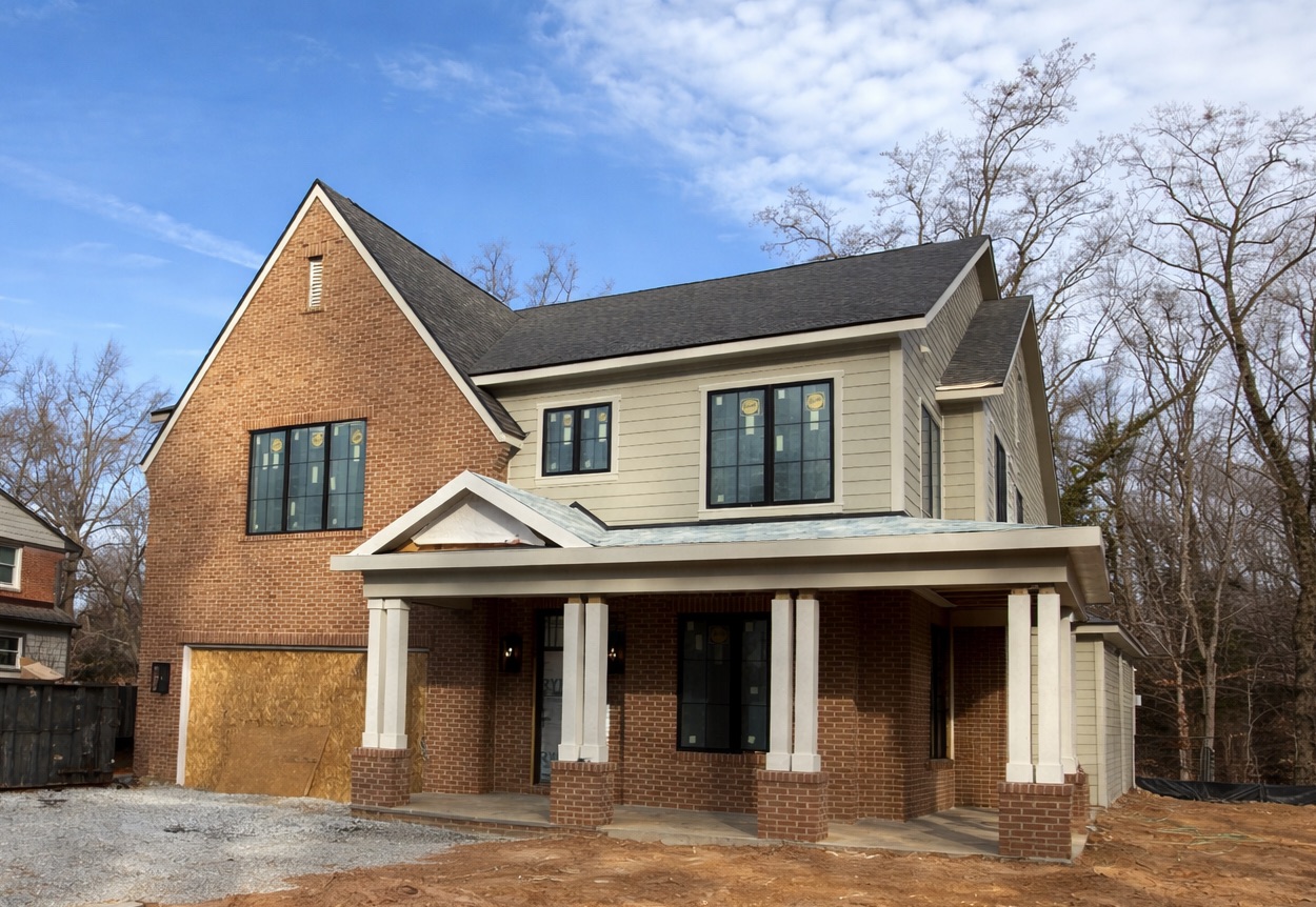 Modern Farmhouse front, clean lines, and a covered porch wide enough to actually sit on.