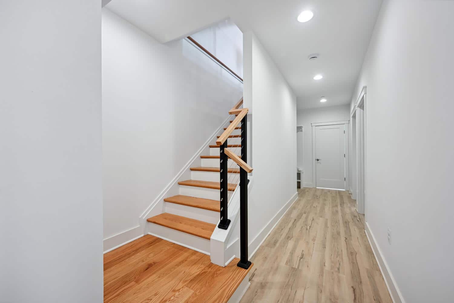 Clean lines, recessed light, a corridor that moves with purpose.