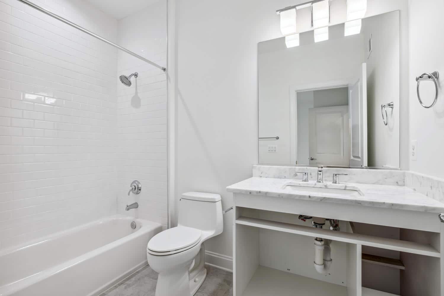 Clean lines, marble surface, a sink that asks nothing of you.