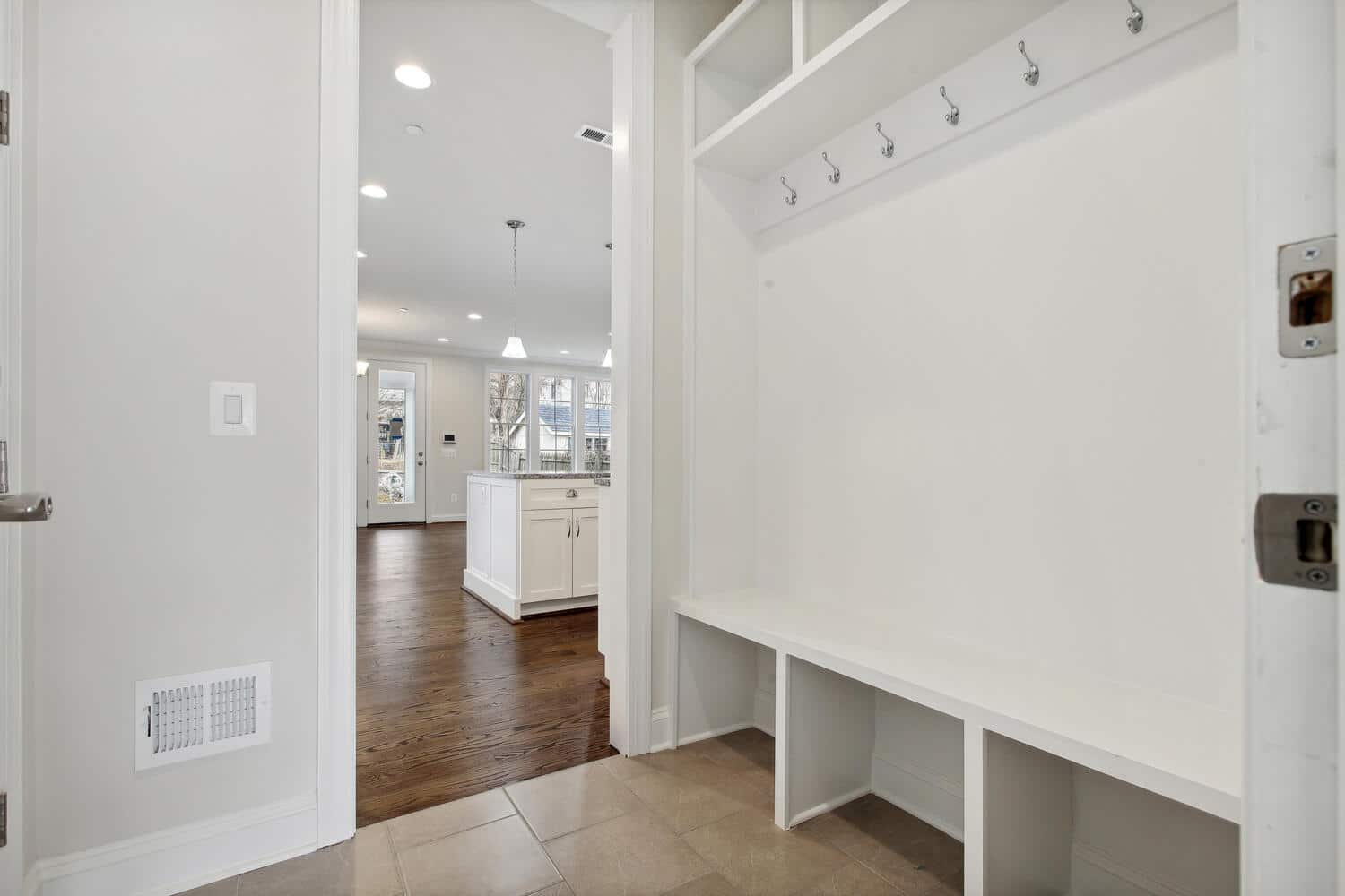 Built-in bench, cubbies, hooks - drop zone done right