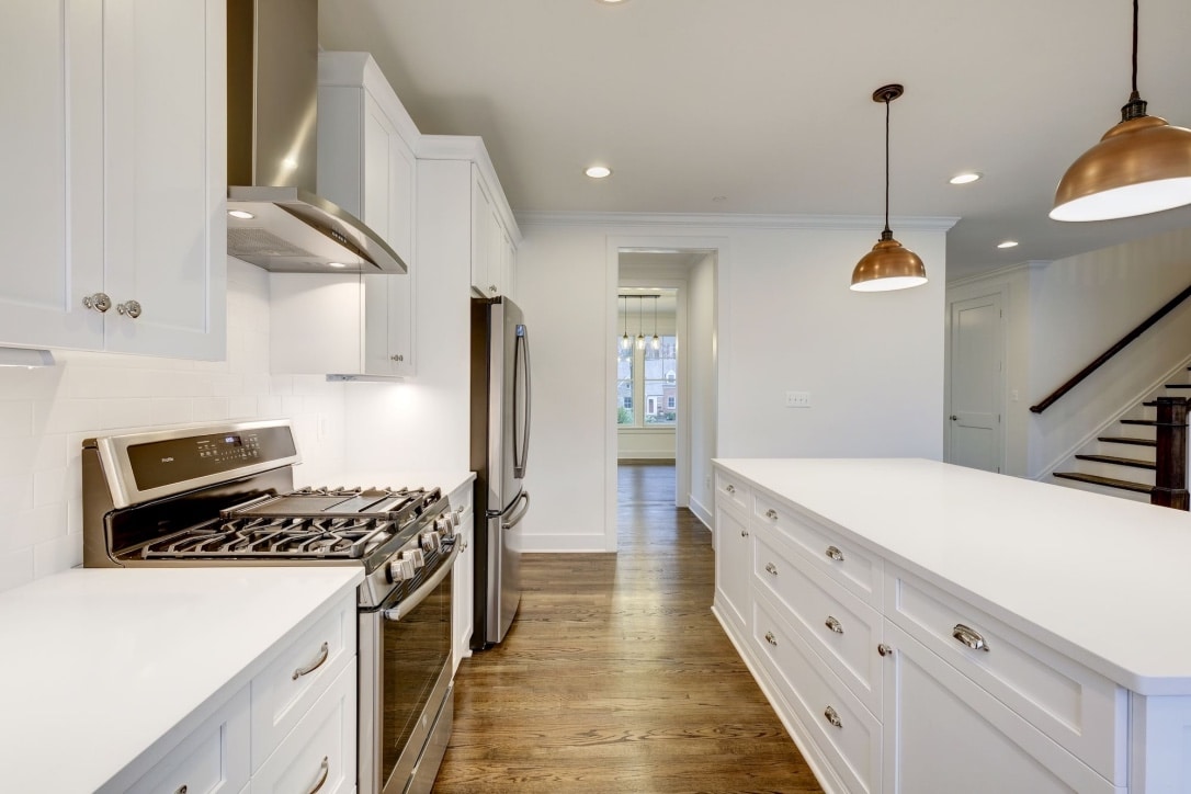 Hood, range, and refrigerator lined up - ready before you are.