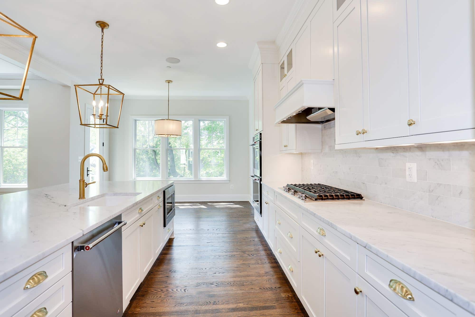 Range wall, hood, double ovens - every task has its lane.