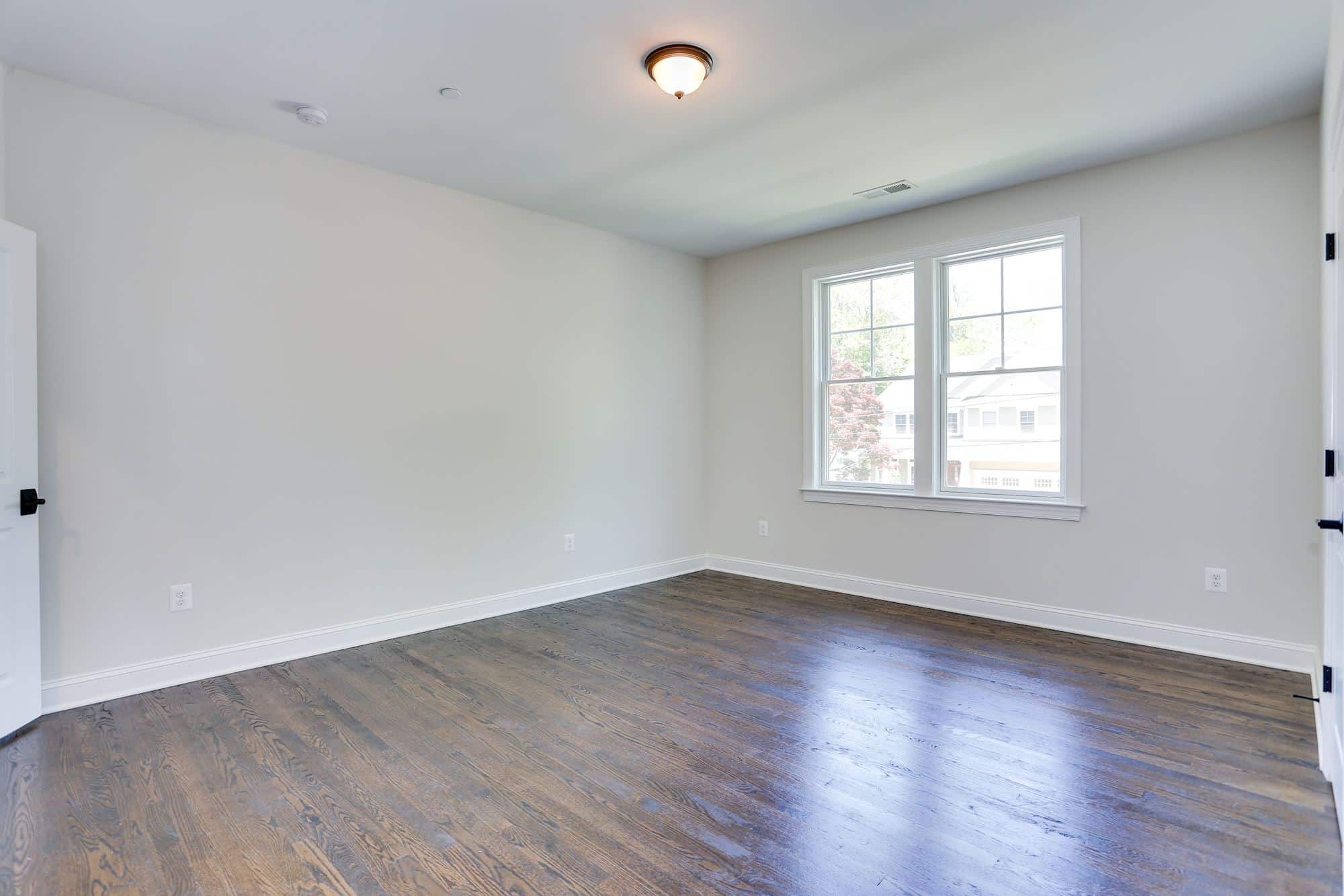 First-floor suite — primary bedroom, guest room, or home office