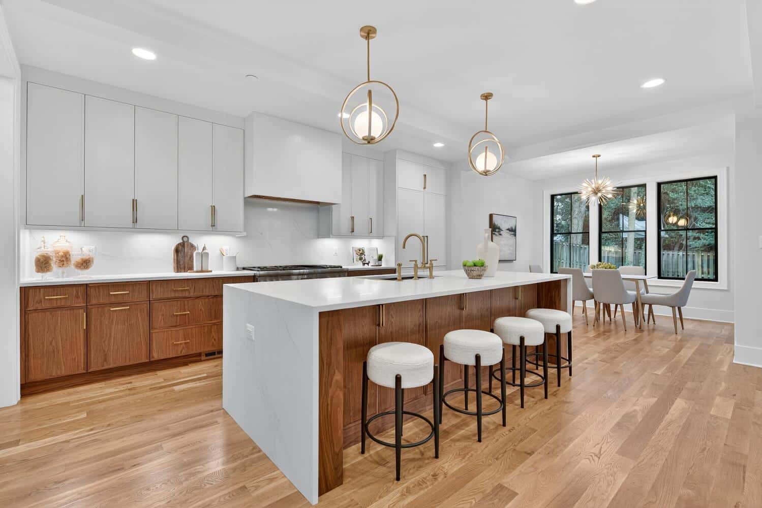 Two-tone cabinetry. Counter seating where everyone lands.