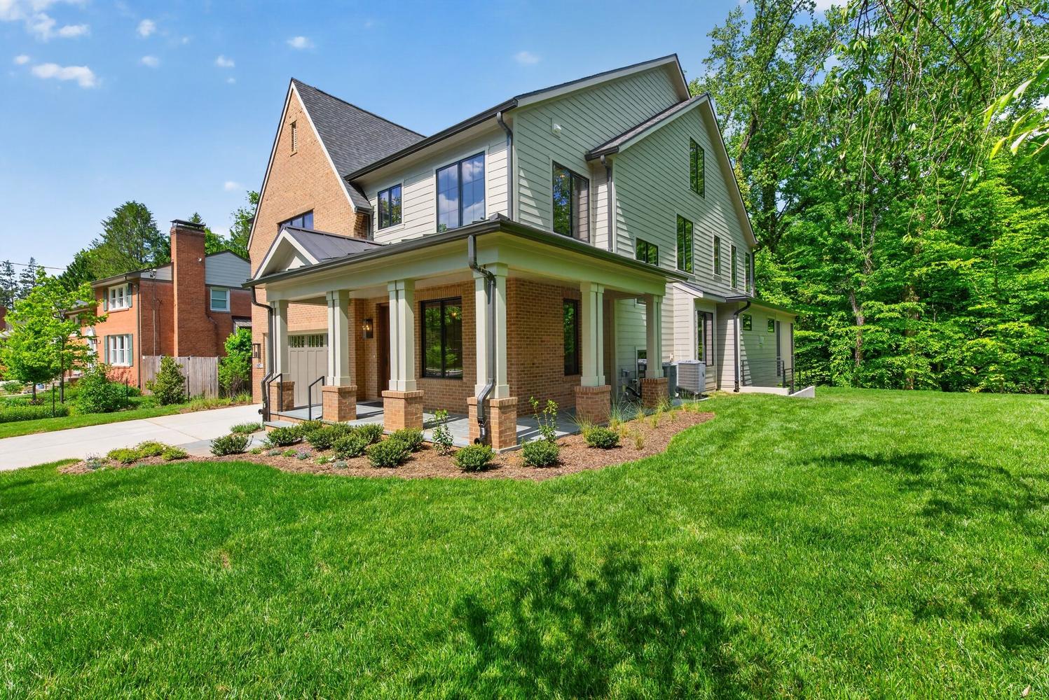 Corner lot presence with a porch built for lingering.