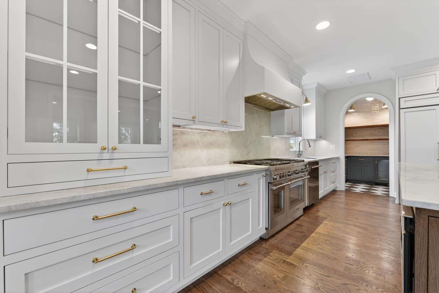 Range wall anchored by a custom hood surround