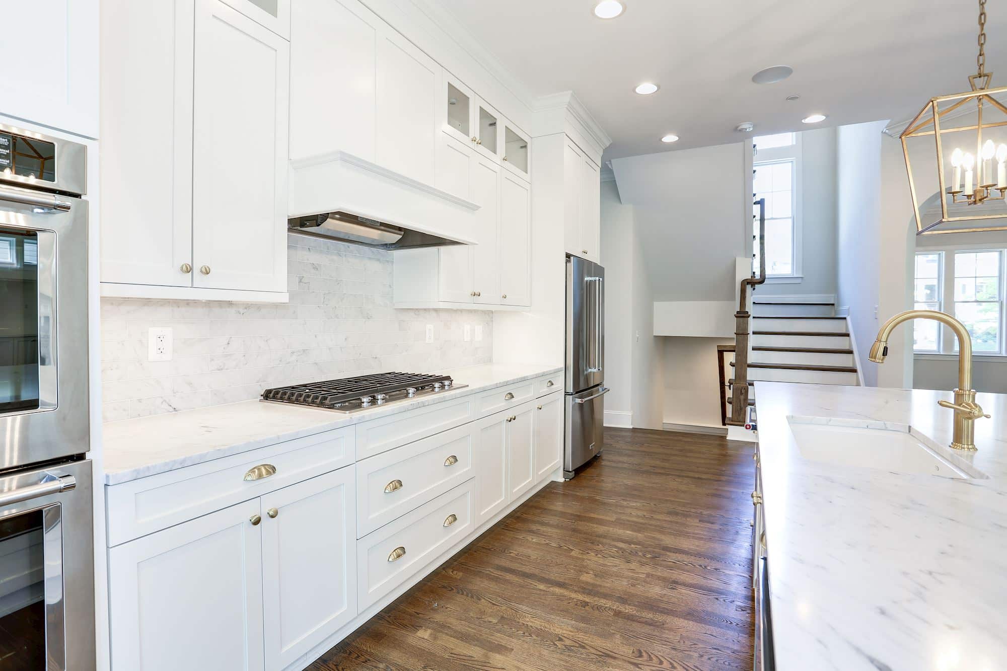 Three pendants mark the center of the floor plan