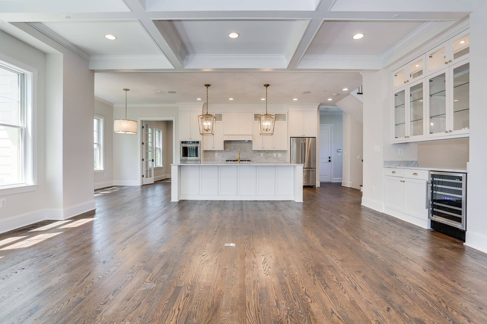 Cabinetry runs wall to wall, island centers it all