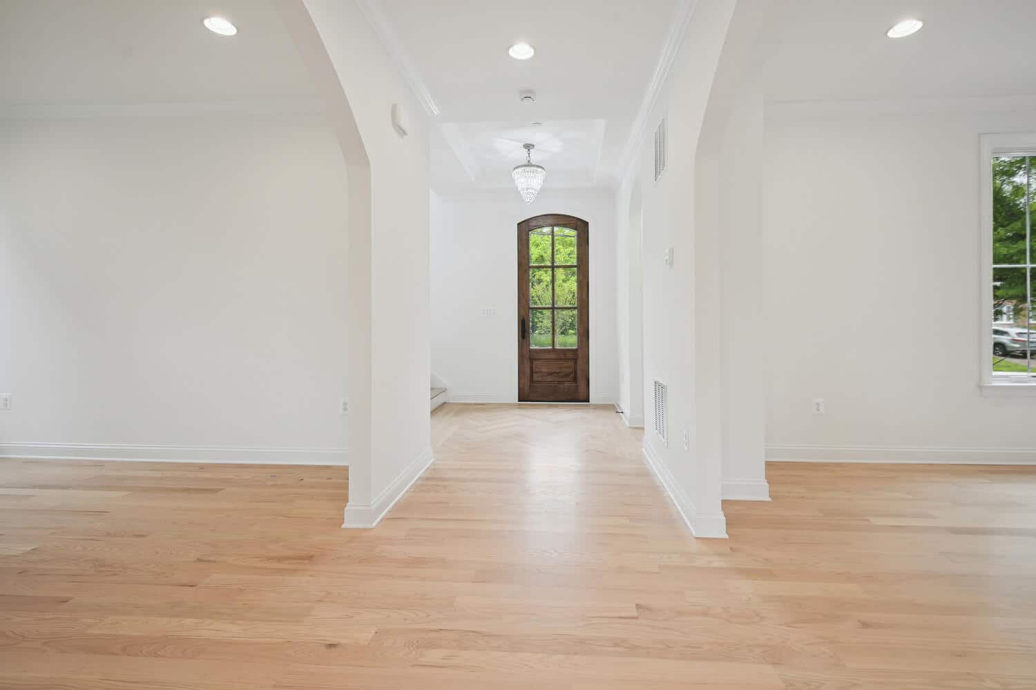 Arched door pulls light deep inside