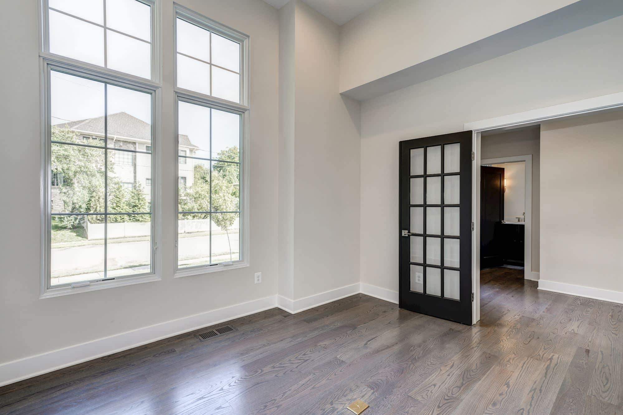 Double-height glass, French door, private beyond